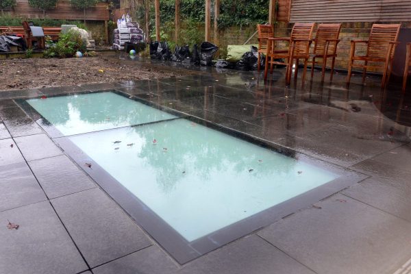Walk on rooflight with privacy glass.